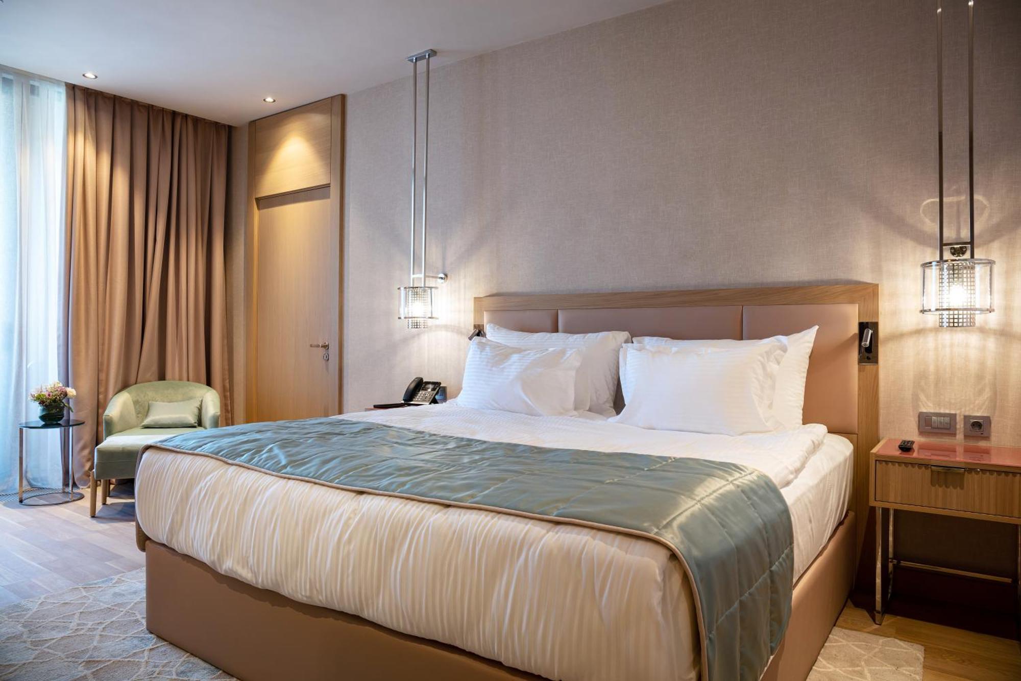 Karavansaray Turkistan Harbour Hotel -Flying Theatre Access 外观 照片 A bedroom at the hotel